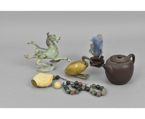 A small collection of Chinese works of art to include a red clay miniature teapot, a carved snuff bottle with apocryphal Qian