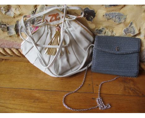 Two 20th century designer bags comprising a vintage Zandra Rhodes soft cream leather 1950s style tote bag with gold tone and 