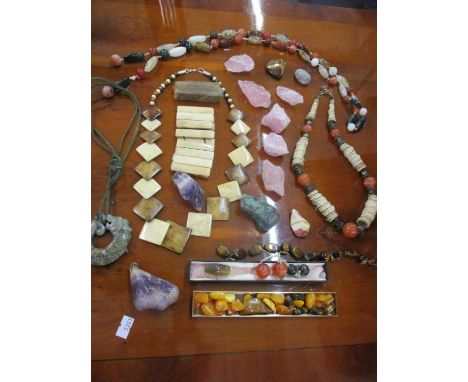 Twentieth century stone costume jewellery and specimen stones to include a Chinese Jadeite pendant in the form of a mythical 