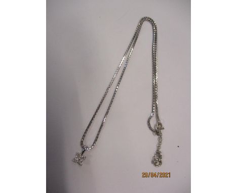 A 18ct white gold chain having a small 18ct white gold and four diamond pendant, total weight, 11.5gLocation: Cab 