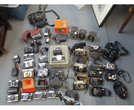 A collection of vintage cameras to include Miranda, Minolta, Olympus, Prinz, Zorki and some modern examples 