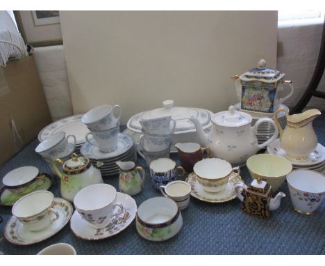 A Royal Doulton Laureate bone china part dinner service, together with a Noritake Blue Hill part tea set, various teacups, sa