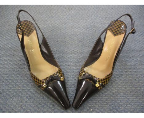 A pair of Louis Vuitton brown leather sling back shoes, in iconic design, size 39.5, with 3.5 inch half block heels, having a