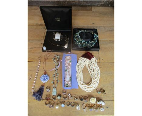 Good quality costume jewellery to include a Gerda Lynggaard from Monies multi-string stone necklace with a large red resin fa