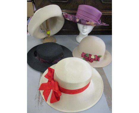 A 20th century Gina Bacconi formal hat in mauve with floral rim and mauve bow to the band, two ladies beige felt hats to incl