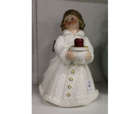 A Goebel porcelain candle holder modelled as an angel.