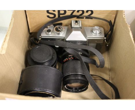 A Praktica 35mm camera with various lenses.