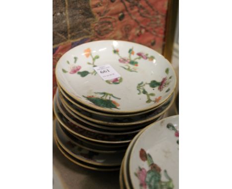 Ten small Chinese floral decorated saucers.