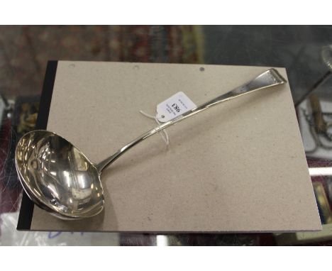 A George III silver ladle.