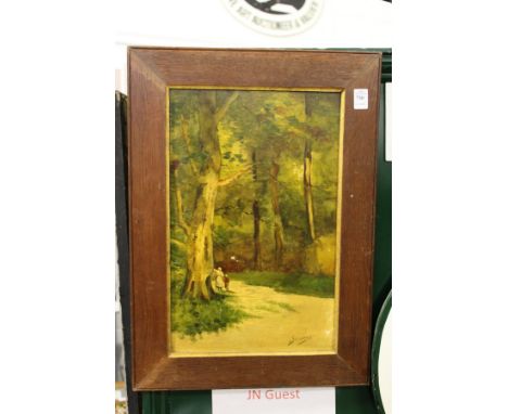 A painted ceramic plaque, framed.