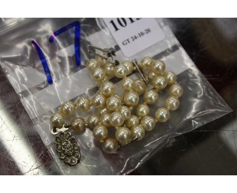 A pearl bracelet.