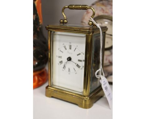An Asprey of London brass carriage clock.