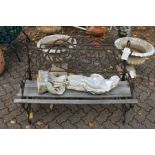 A cast iron garden bench.