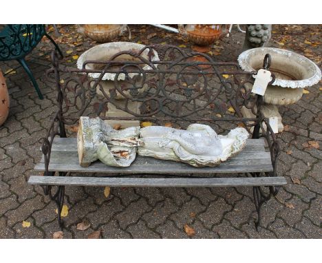 A cast iron garden bench.