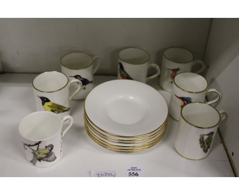 A set of six Hammersley china coffee cups and saucers decorated by Roland Ward with various birds, together with a similar cu