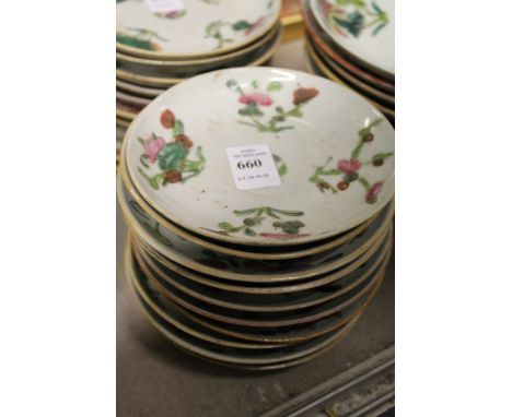 Ten small Chinese floral decorated saucers.