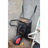 A builder's wheelbarrow.