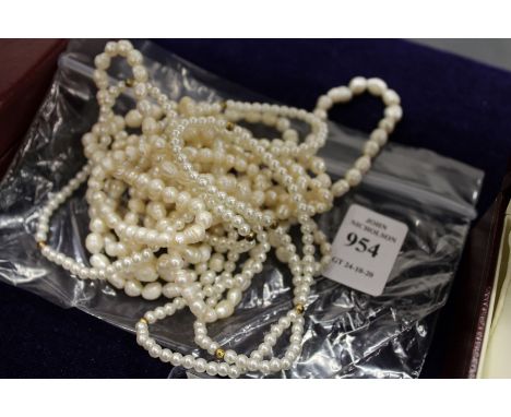 Pearl necklaces.
