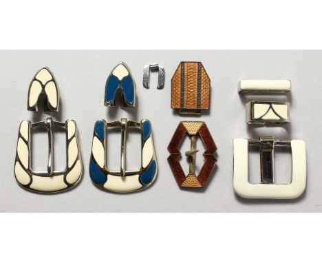 A group of enamel buckles.