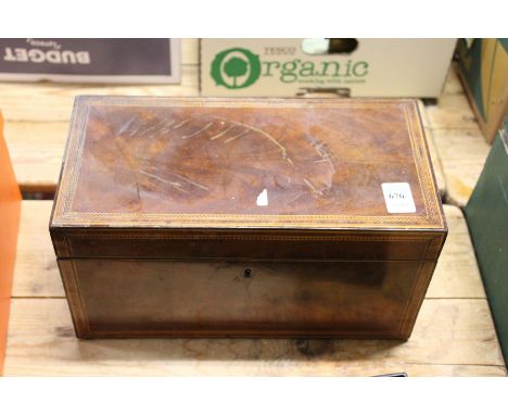 A Georgian tea caddy.