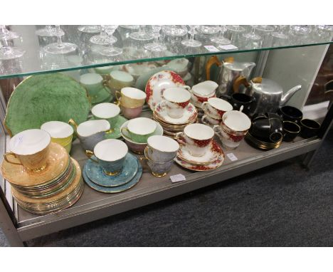 A Paragon Rockingham part tea service, Royal Albert Gossamer cups, saucers and plates, another part service and other items.