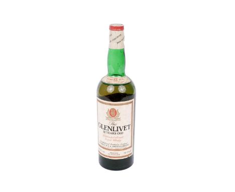 A bottle of The Glenlivet unblended all malt Scotch whisky, 12 years old, 26 2/3 FL Oz, 70 proof.
