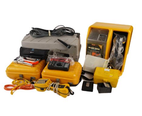 A quantity of assorted tools, to include: electrical testers, a tool box and contents, and others; together with a payphone.
