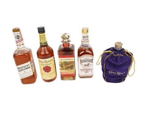 Five bottles of American and Canadian whiskeys, comprising of: Crown Royal fine de luxe blended Canadian whisky, 70cl, 40%; M