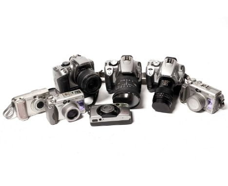Seven Canon digital cameras, comprising: a Canon EOS 350D camera, fitted a Sigma 17-35mm lens; a Canon EOS 300D camera, fitte