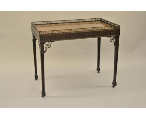 Good 19th Century mahogany silver table of Chippendale design, the rectangular galleried top above a blind fretwork frieze an