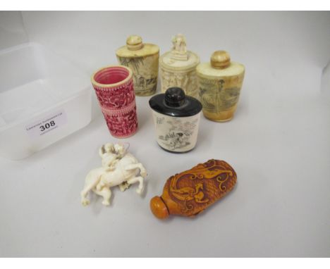 Two 20th Century Chinese bone snuff bottles, 19th Century Indian carved ivory cylindrical box, a composition snuff bottle, di