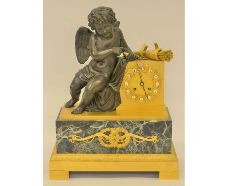 19th Century French dark patinated and gilt bronze and marble mantel clock, surmounted by a figure of a cherub, the two train