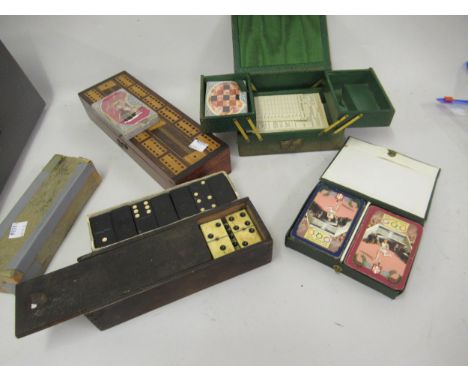 Inlaid cribbage board, together with various sets of playing cards and dominoes etc. 