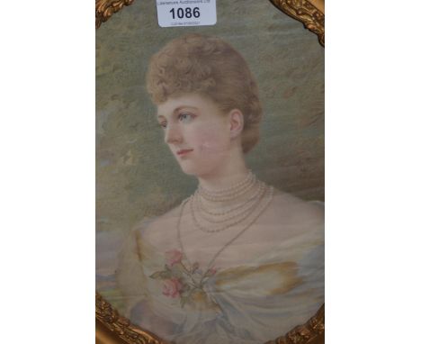 Oval gilt framed print on silk, head and shoulder portrait of a lady, 11ins x 9ins 
