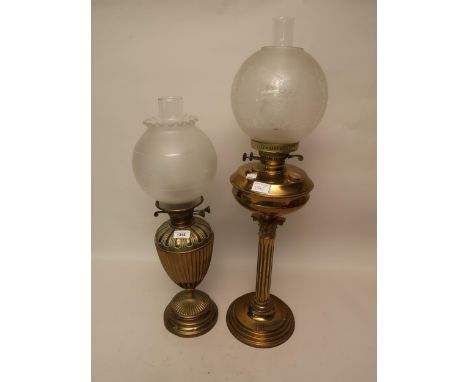 Late 19th / early 20th Century brass oil lamp of baluster form having etched glass shade and an early 20th Century brass Cori