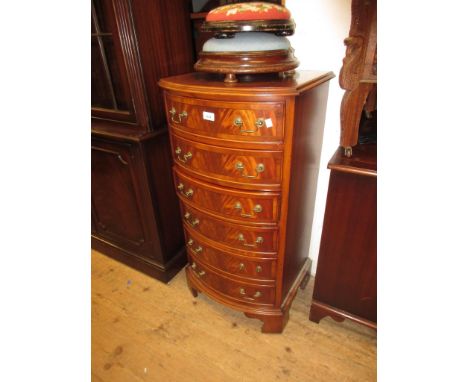 Reproduction mahogany yew wood crossbanded and line inlaid bow fronted chest of six drawers with brass swan neck handles, on 