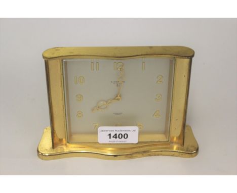 Looping brass cased mantel clock with alarm function, the silvered dial with Arabic numerals, inscribed Heinicke, Zurich 