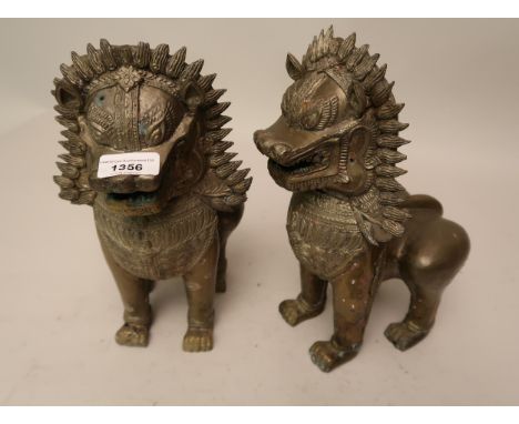 Pair of heavy bronze dog of foe temple figures, 12ins high 