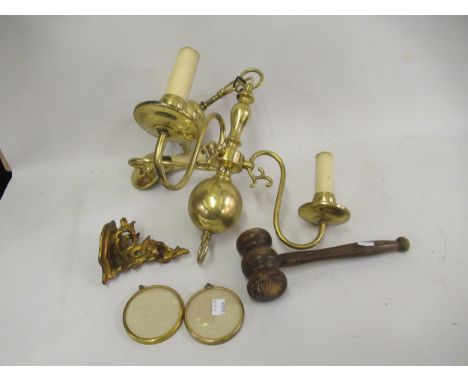 Large wooden gavel, small giltwood bracket, pair of circular brass miniature frames and a brass three branch chandelier 