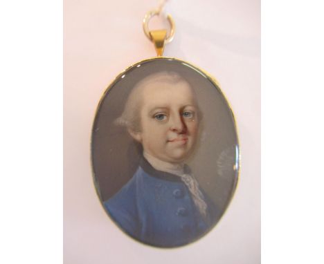 18th Century watercolour portrait miniature of a gentleman wearing a blue coat, 35mm x 23mm approximately, in a gilt metal br