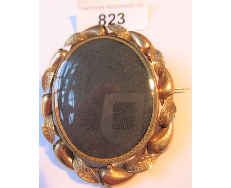 Victorian oval yellow metal mounted portrait brooch, 27gms gross weight 