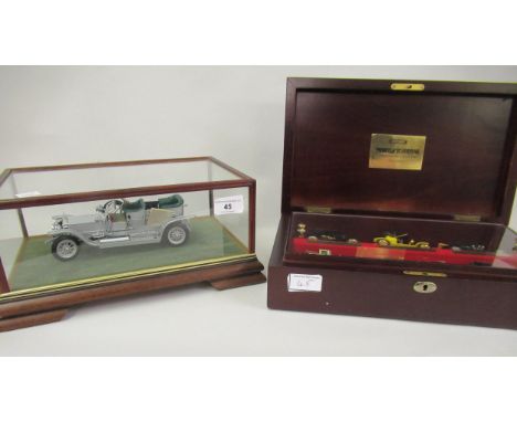 Franklin Mint 1:24 scale model of a Rolls Royce Silver Ghost in a glazed mahogany case, with original documentation (lacking 