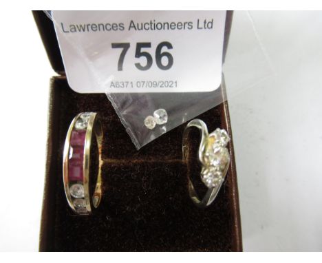 Unmarked yellow metal half eternity ring set red and white stones, together with a small white metal ring set three stones, p