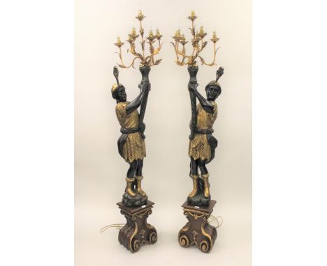 Pair of reproduction carved, gilded and ebonised lamp standards in the form of Venetian blackamoor figures, each with a six b