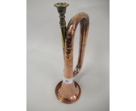 Copper bugle with brass mouthpiece engraved with a Royal crest and inscribed ' George Potter & Co. Aldershot ' 