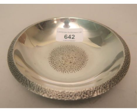 London silver circular low trinket dish by Christopher Nigel Lawrence, having hammered or engraved decorated effect, 5.25ins 