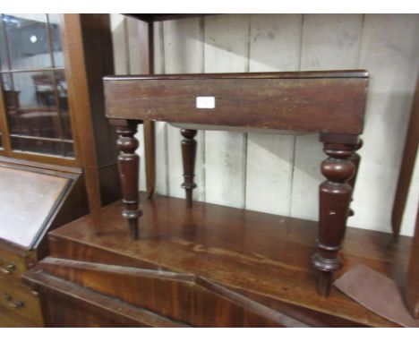 19th Century mahogany rectangular bidet with original ceramic liner, on turned tapering supports 