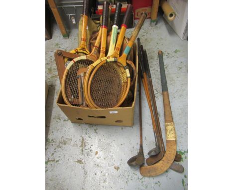 Various Dunlop tennis rackets, two tennis bags, hockey stick, a leather holdall and various golf clubs 