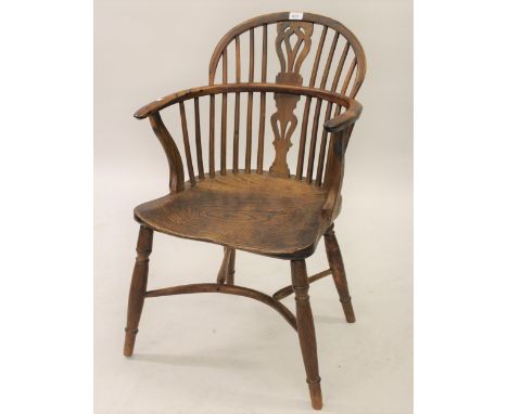 Late 18th / early 19th Century yew wood and elm seated Windsor slat and stick back elbow chair on turned supports with crinol