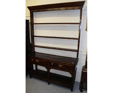 Small George III oak dresser, the open shelf back above two drawers with square cut supports and undertier, 52ins wide x 15in